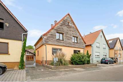 Haus zum Kaufen in Oberhausen-Rheinhausen 430.000,00 € 220 m²