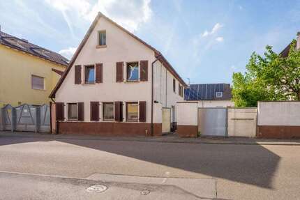 Haus zum Kaufen in Lampertheim-Hüttenfeld 195.000,00 € 105 m²