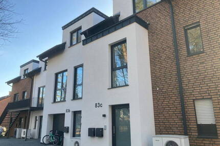 Neubau-Reihenh. mit 166 m² Wfl. + 26 m² Spitzb.|Garten,Terr.+Dachterr.|Keller, Garage+StP - Schloß Holte-Stukenbrock