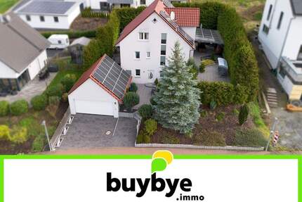 Heustreu: Modernes Einfamilienhaus mit Einliegerwohnung, ein Zuhause für Generationen