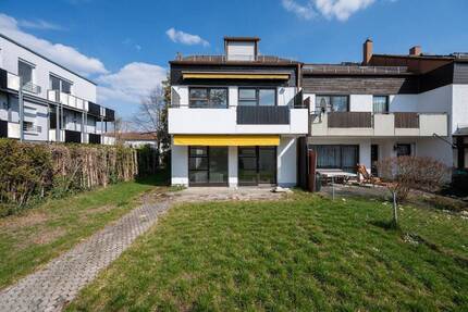 AIGNER - Gestalten statt Kompromisse: Reiheneckhaus mit Garten und Ausbaupotenzial in Aubing - München Aubing-Lochhausen-Langwied