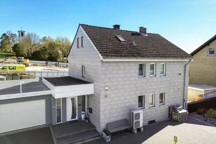 Familienglück trifft Effizienz: Ihr modernes Zuhause mit Weitblick in Vlotho!