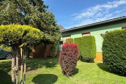 EFH mit viel Nebengelass, Garage, Carport, sehr gepflegter Garten in einer ruhigen, waldreichen Umgebung unweit vom Stadtzentrum und Haffbad - Torgelow