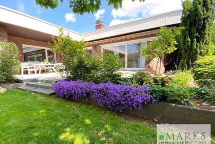 Stilvolles Architektenhaus mit Einliegerwohnung in Lübeck-St. Jürgen auf traumhaftem Hanggrundstück