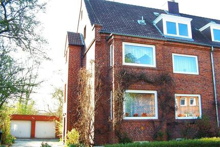 Stilvolles Mehrfamilienhaus mit großem Garten in Kieler Bestlage