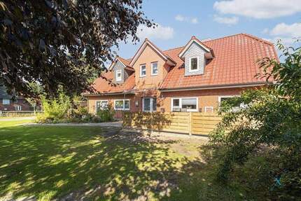 Wohnen im Einklang mit der Natur - modernisiertes Landhaus mit Einliegerwohnung & Badesee - Bordelum / Büttjebüll
