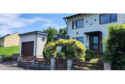 Einfamilienhaus in ruhiger Lage, mit traumhaftem Ausblick und viel Entwicklungspotenzial - Retzstadt