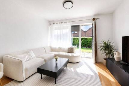 Helle Erdgeschosswohnung mit Terrasse und privatem Gartenanteil in bevorzugter Lage von Norderstedt
