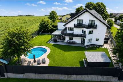 Haus zum Kaufen in Zusmarshausen 849.000,00 € 209 m²