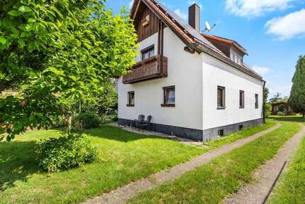 Kleines EFH mit Anbau-Umbau-Neubaupotential auf großem Grundstück - München