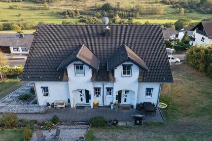 Wohnen mit Reihenhauscharakter–großzügige 3-Zi-Maisonette-Wohnung - Breitscheid