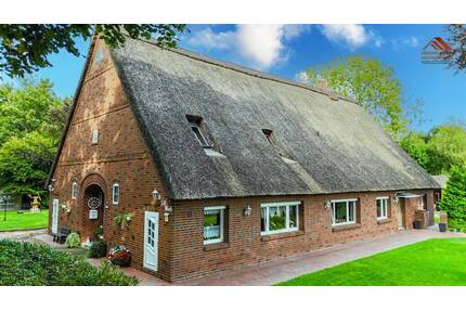 Großes Reetdach-Zweifamilienhaus auf ca. 3400m² in Sievern - Geestland