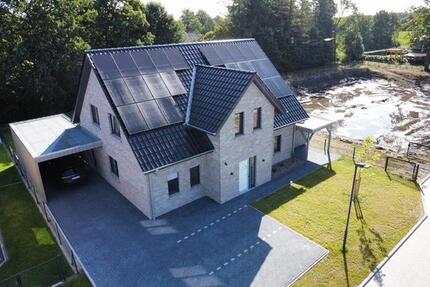 Einfamilienwohnhaus mit zwei Wohneinheiten, Carport und Geräteraum - Barßel