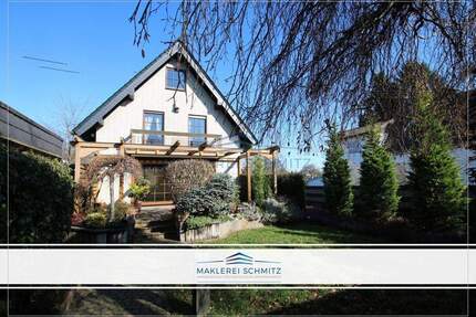 Hochwertig! Ideales Familienhaus mit schönem Garten, Garagen und Innenpool zentral in Niederkassel