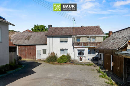 Vermietetes Einfamilienhaus mit Schopf und Carport mitten im Kammeltal