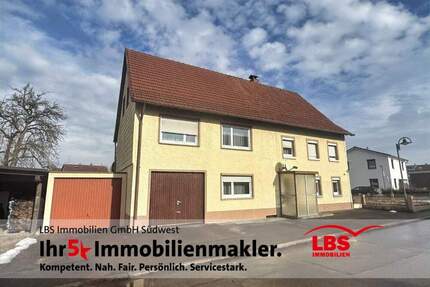 Ein-bis Zweifamilienhaus mit 2 Garagen + großem Garten in toller Lage - Stetten