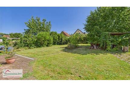 BECKINGEN: WOHNHAUS MIT SCHÖNEM GARTEN UND GARAGE IN ZENTRALER LAGE!