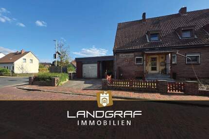 Charmante Doppelhaushälfte mit Potenzial auf tollem Endgrundstück mit Keller und Carport! - Dünsen