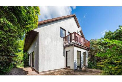 Großzügiges Einfamilienhaus mit Einliegerwohnung, Kamin, Gartenidylle & Pool in Priester - Priester OT Krostitz