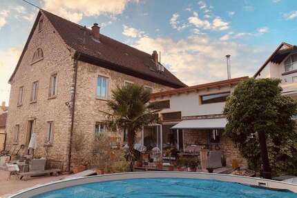 Haus zum Kaufen in Stadecken-Elsheim 855.000,00 € 326 m²