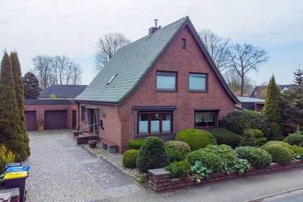 Charmantes Einfamilienhaus mit Einliegerwohnung auf großzügigem und sonnigem Grundstück in Fockbek