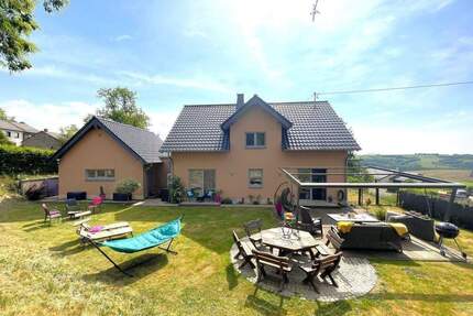 Hochwertiges Einfamilienhaus in massiver Bauweise mit großem Grundstück und durchdachtem Wohnkonzept - Plascheid