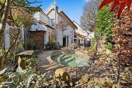 Haus zum Kaufen in Mainhausen 495.000,00 € 170.8 m²