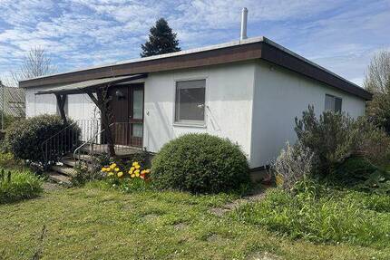 Einfamilienhaus in wunderschöner Lage und mit Gartengeschoss-Wohnung - March-Buchheim