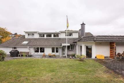 Attraktives Mehrfamilienhaus mit 3 Wohneinheiten, großem Grundstück & Garagen – vielseitig nutzbar in Lüdenscheid - Pöppelsheim