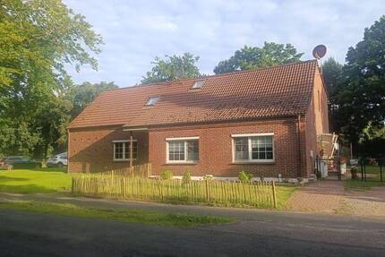 Doppelhaus mit Weitblick - Vielseitige Wohn- und Investitionsmöglichkeit auf großem Grundstück in Zetel-Bohlenbergerfeld