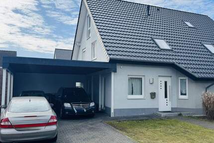 Charmante Doppelhaushälfte mit Garten, überdachter Terrasse und Doppelcarport! - Bielefeld Milse