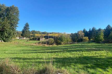 Ländlich gelegenes Baugrundstück für ein Einfamilienhaus in Niederau