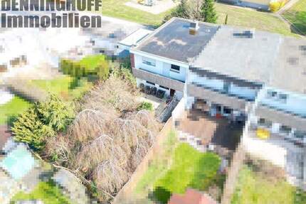 Modernisierungsbedürftiges Reihenendhaus mit 2 Garagen in Dortmund-Sölde