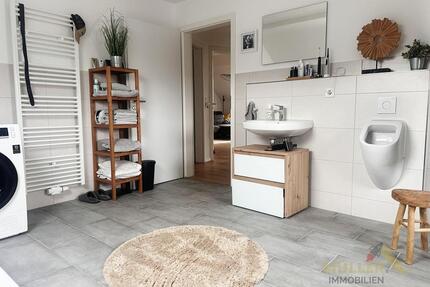 Mietwohnung einer modernen 3 Zimmer-Wohnung im 1.Og (mit Garten) nach Sanierung i.r.L von Schwalbach