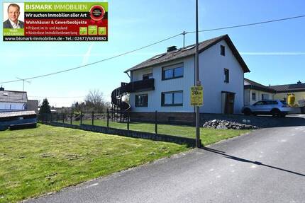 Freistehendes Einfamilienhaus mit großer Garage und sehr schönem Garten. - Urschmitt