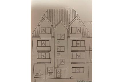 Mehrfamilienhaus mit Gewerbeeinheit in Osnabrück und vier Garagen