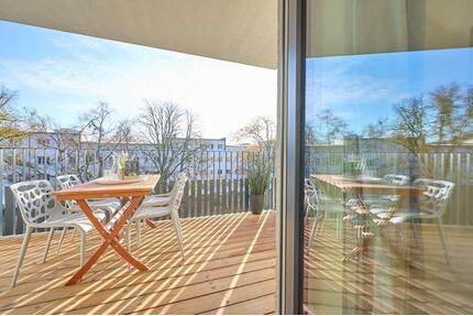 Cosmo Berlin - großzügige 3 Zimmer mit Balkon zum Hofgarten im Erstbezug