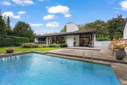 Neu-Isenburg Zeppelinheim: Freistehender Bungalow mit Pool und Einliegerwohnung