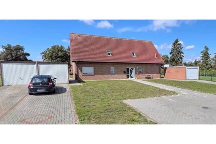 Oberwohnung mit 2 Garagen und überdachter Terrasse in WOL - Rhauderfehn