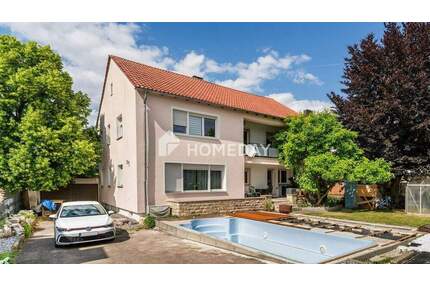 Familienidyll mit Potenzial: stilvolles Zweifamilienhaus mit Pool und Garten in Ingolstadt