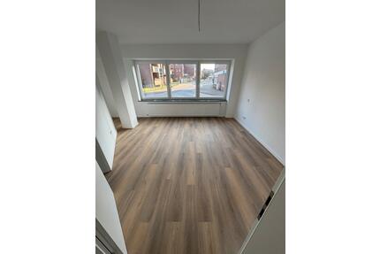 Exklusives Garten-Loft: Erstbezug mit Kamin im Herzen Aschebergs