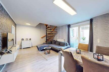 PHI AACHEN - Vollvermietetes Investmentpaket mit Stellplätzen in zentraler Lage von Baesweiler!