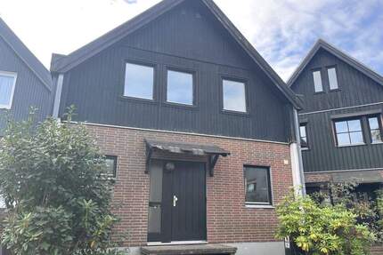 PURNHAGEN-IMMOBILIEN - Reihenendhaus in Holzständerbauweise in ruhiger Lage von Bremen-Grohn - Bremen / Grohn