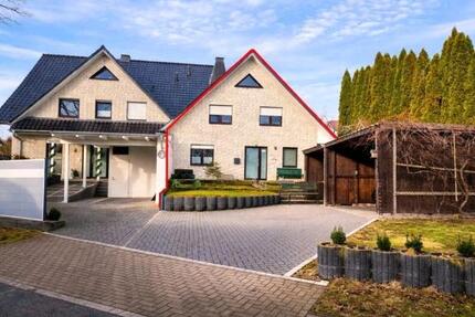 Verklinkertes reihenhaus mit zwei wohnebenen ,garten und carport - Stemwede