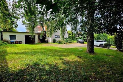Einfamilienhaus mit Büro und großer Garage in Molfsee