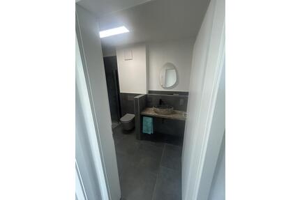 Erstbezug in Voxtrup: Hochwertige, teilmöblierte 2,5-Zimmer-Neubauwohnung mit Balkon ins Grüne - Osnabrück Gretesch