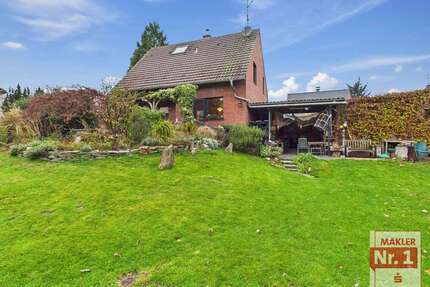 Haus zum Kaufen in Hünxe 419.000,00 € 100 m²