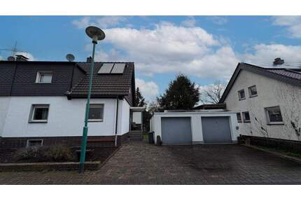 Ruhige Doppelhaushälfte in Sackgassenlage mit Doppelgarage und Garten in Duisburg Alt-Walsum!