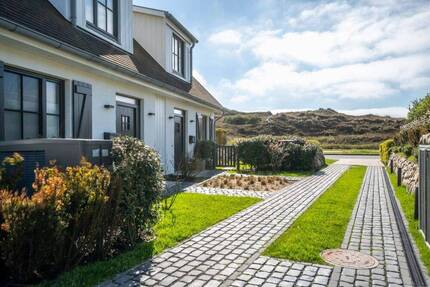 Exklusive Doppelhaushälfte in Sylt - Neubau mit Designerinterieur und Dünenbezug