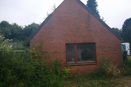 Kleines Haus auf großem Grundstück mit Garage zu verkaufen - Rieseby